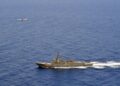 P-8A-Poseidon-flies-over-USS-Momsen